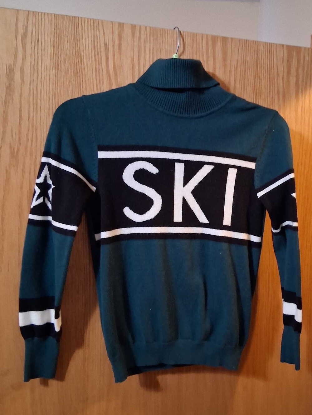 Schild Merino Wool Long sleeve Sweater from the luxury ski brand Perfect Moment.